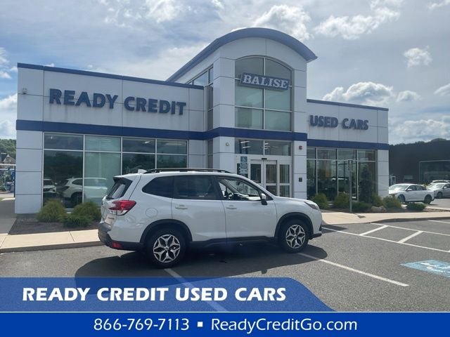 2023 Subaru Forester Premium in Crystal White Pearl — front three-quarter view