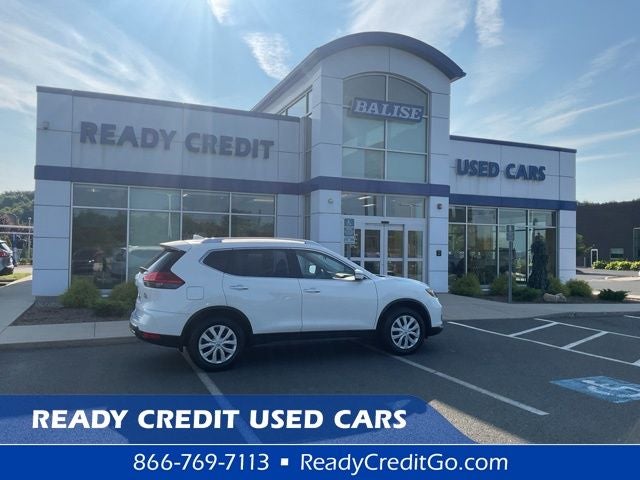 2017 Nissan Rogue S in Glacier White — front three-quarter view